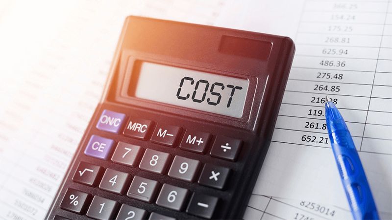 An Image Of A Calculator Showing The Word Cost